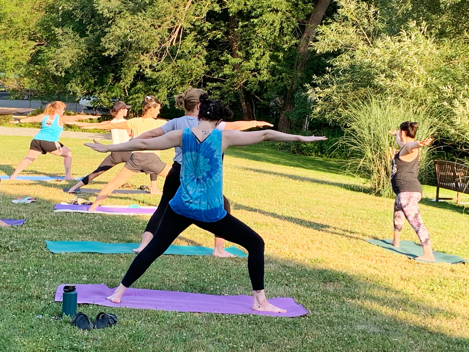 The first class of Creekside Sunset Yoga took place on July 11th in the park.