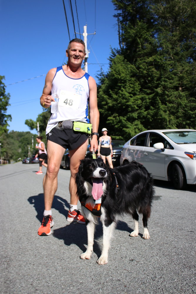 Peter Verdesi from Beacon, NY ran the 10K with his dog Jackie coming in at 45:45.