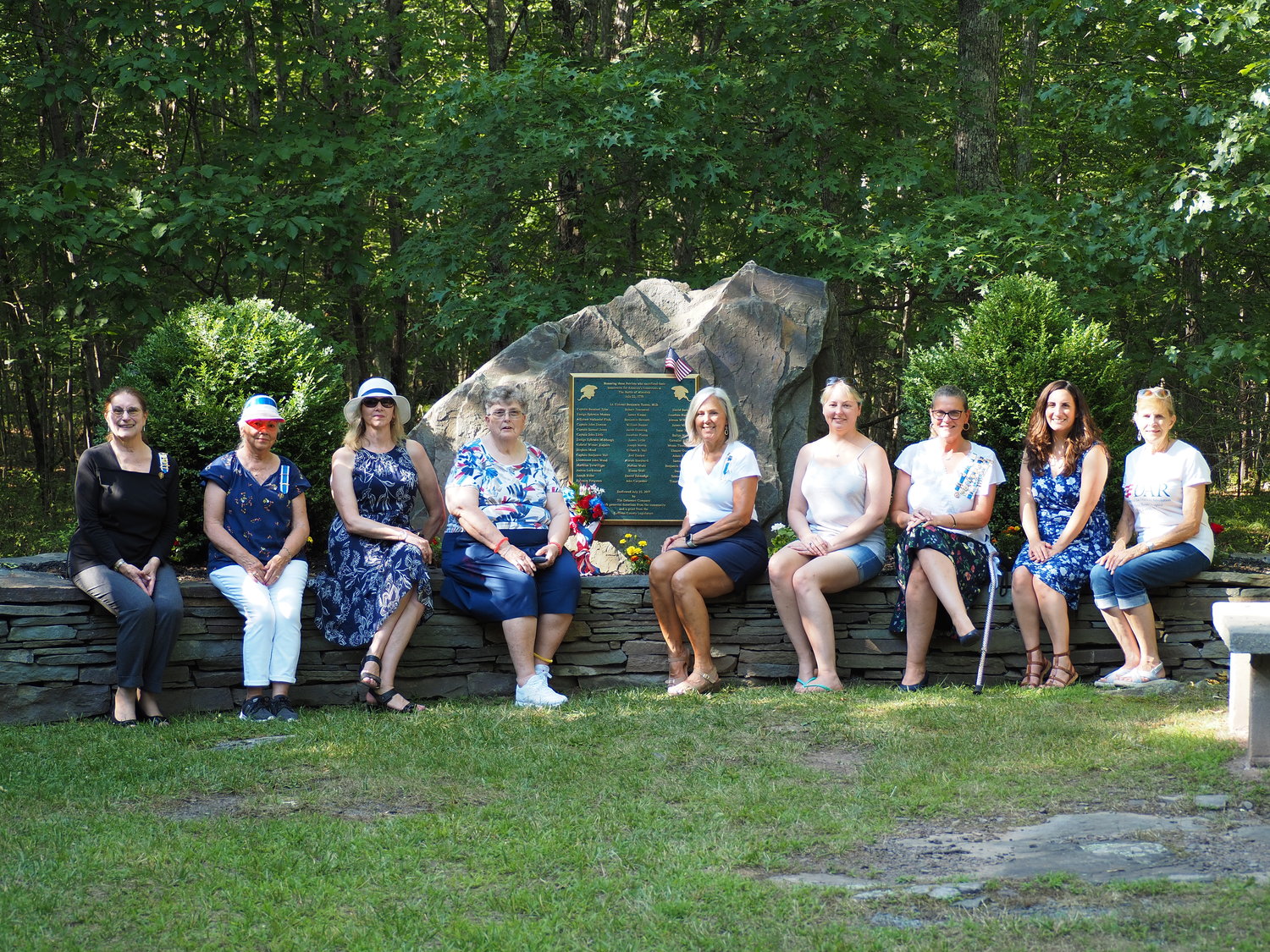 At the Minisink battlefield near Barryville in July, the National Society of Daughters of the American Revolution (NSDAR) members gathered together, following an honored tradition, to lay flowers at the soldiers’ monument in conjunction with the commemoration ceremony that was held this year. Left to right, Lynn Priebe of the Beaverkill Chapter; Secretary Mary Iulo and Treasurer Doreen Bensen of the Wayne Chapter; Helen Hoering and Regent Bambi Meadow, of the Beaverkill Chapter; Jennifer Calabria, Regent Krista Brink, Vice Regent Rachel Innella, and Historian Lois Cronic of the Old Mine Road Chapter.