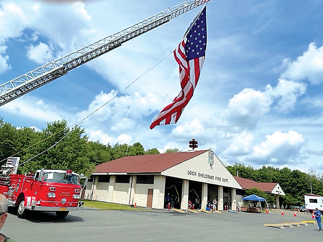Terry Davis’ 1984 Mack Aerial Ladder Truck won first place in the Fire Truck category. While the body of the truck is not in the frame of this photo, its ladder can be seen proudly displaying the American Flag.