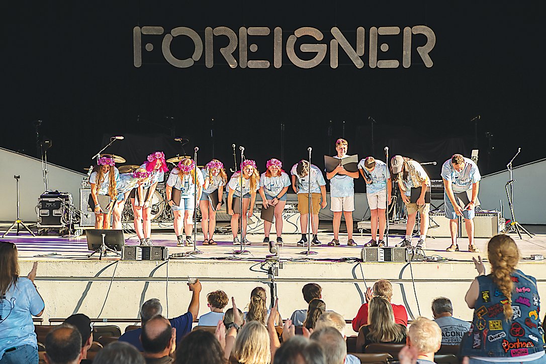 The Sullivan West Select Choir takes a bow after performing on the Main Stage at Bethel Woods Center for the Arts on August 7, opening for Foreigner and Don Felder.
