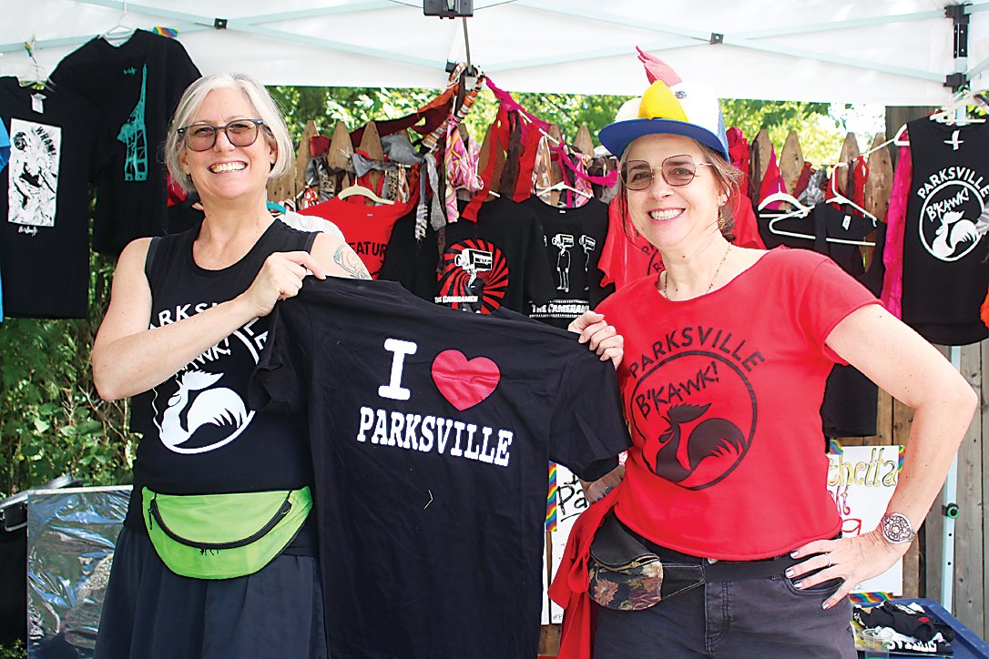 Tanya Skinner (left) and Ramona Clifton were helping to spread some community spirit with Parksville-themed merchandise.
