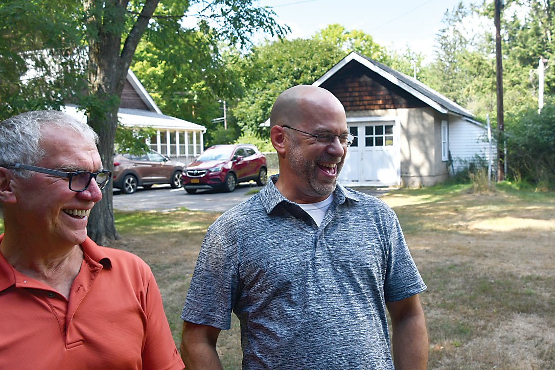 What better way to spend a day than sharing a laugh with your son-in-law at a family reunion? Here Craig Schumacher, left, and son-in-law Mike Allen enjoy a joke during the reunion.
