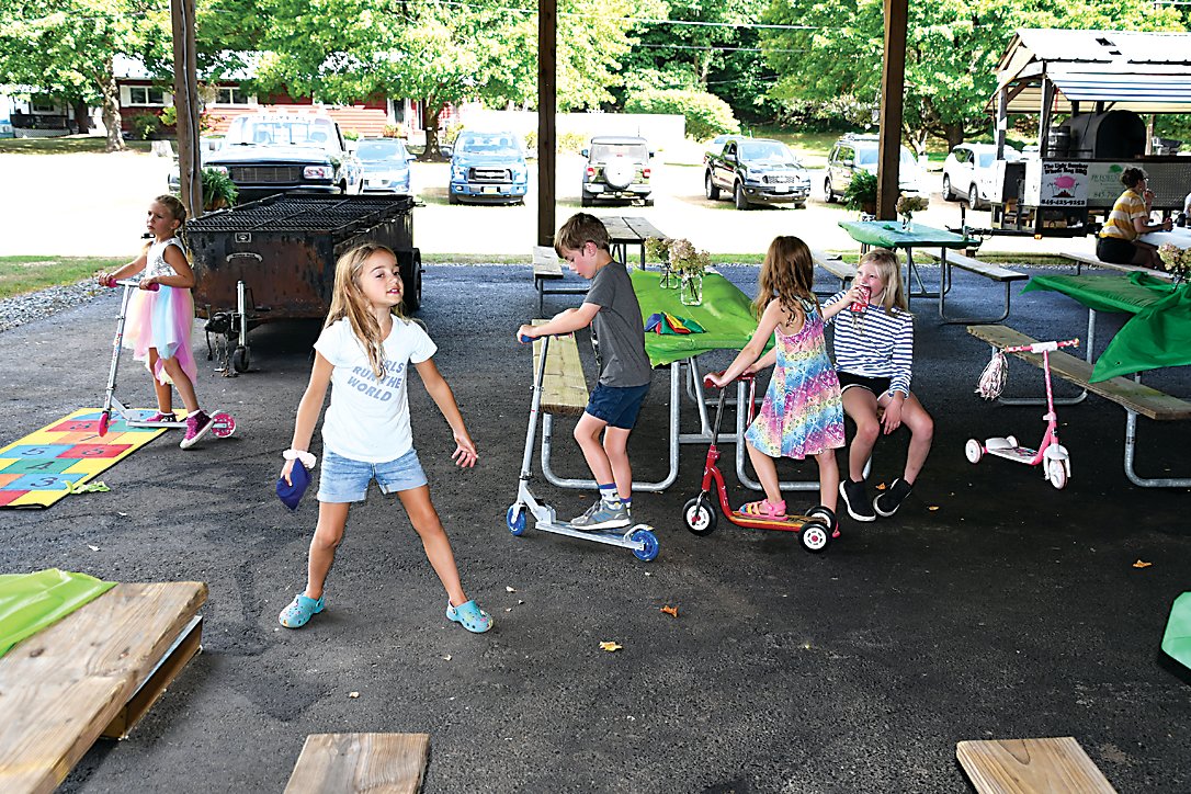 The youngest family and friends had plenty to do on Saturday, including corn hole, scooter riding and listening to some great family stories. Pictured here are Mya, Oliver, Elaine and Olivia.