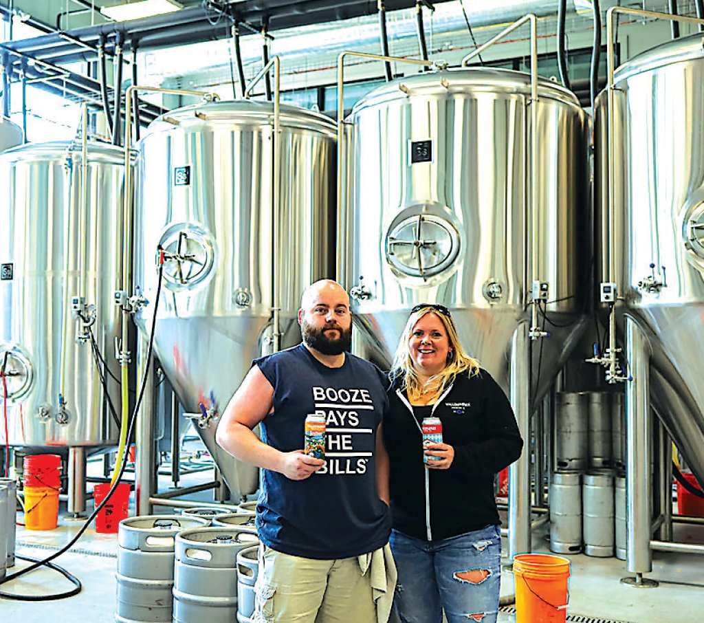 Wallenpaupack Brewing Co. head brewer Logan Ackerley and owner Becky Ryman celebrated as their Paupack Cream Ale recently took first place in its catergory from the The World Beer Awards.