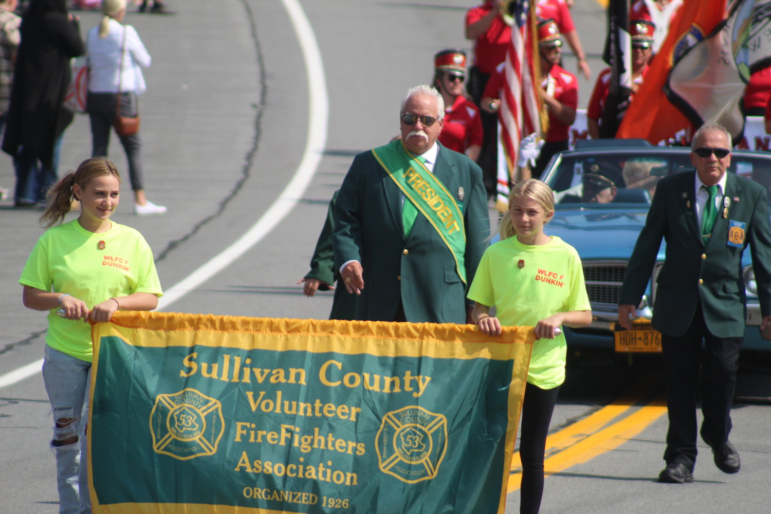 Sullivan County Volunteer Firefighters Association President Mullen marches in Saturday's parade.