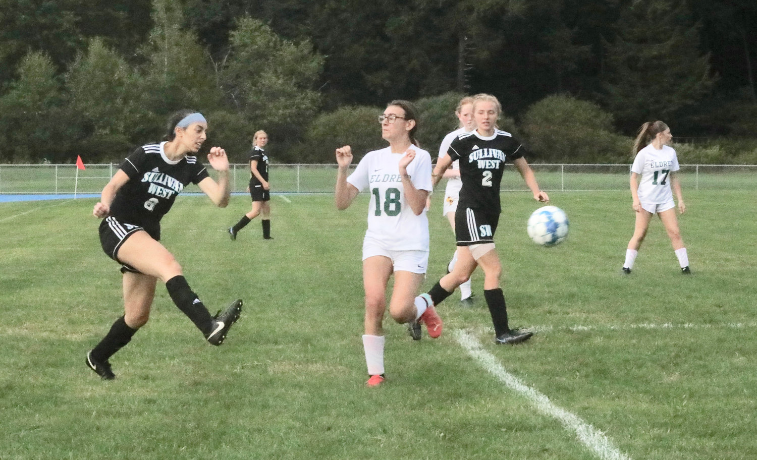 Sullivan West junior Viola Shami sends the ball past defender Rayanna Quintona. Shami recorded the hat trick with a trio of goals in the 8-0 shutout of young Eldred.