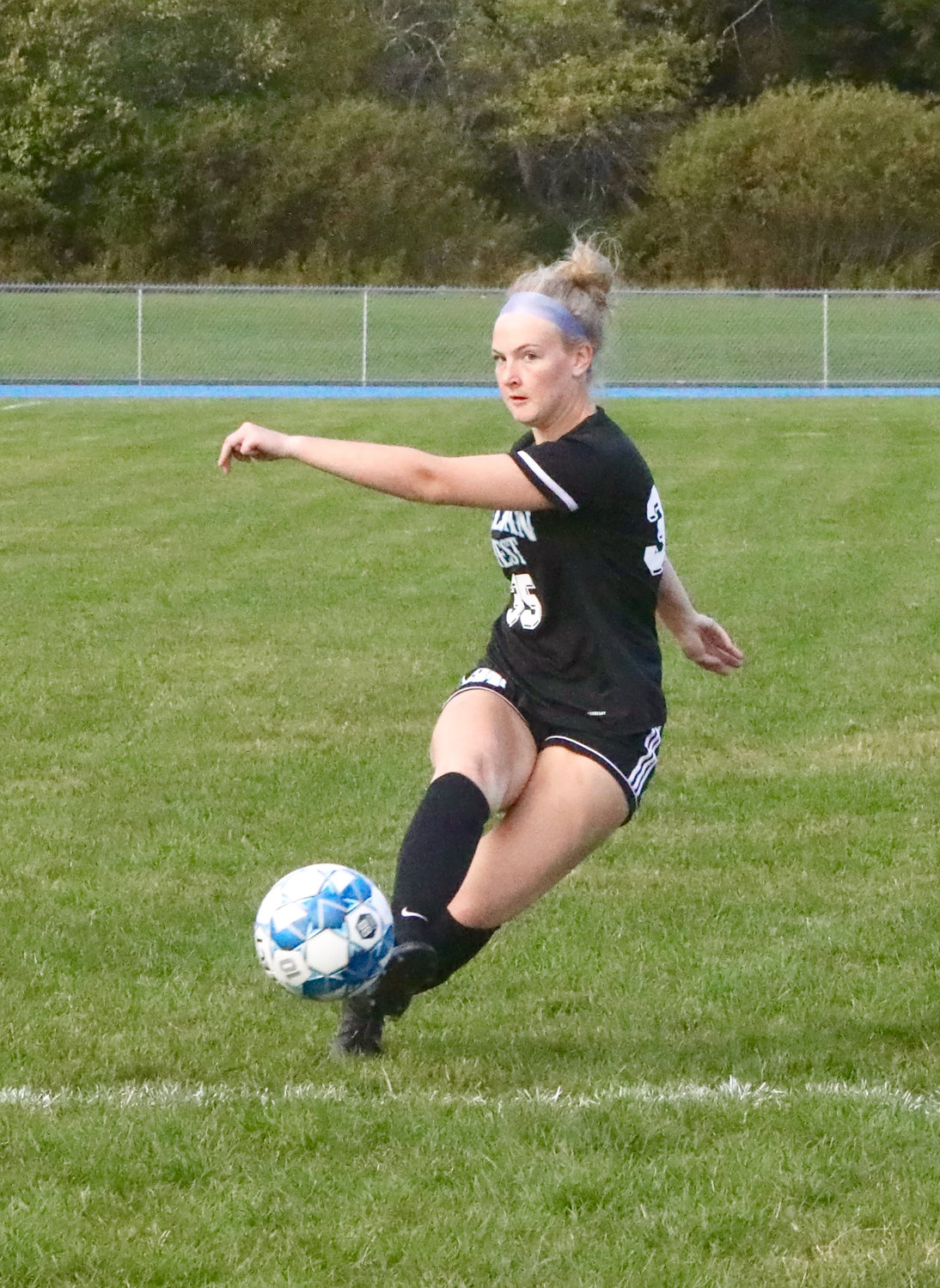 Sullivan West senior Lucia Kennedy fires a shot on goal. She scored one of the eight goals on the day.