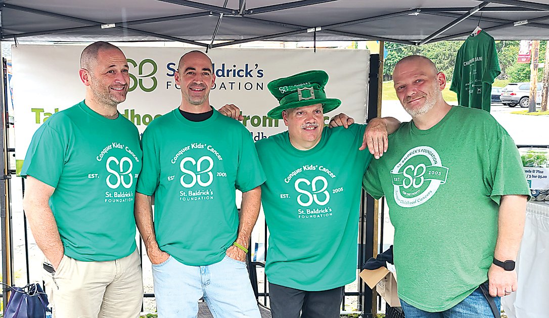 Dr. Jeffrey Weinstein who is shaving his head for the eighth time, first time shaver Dan Giglio (Isabella Giglio’s dad), organizer Lou Monteleone shaving for the sixteenth time and first time shavee Jeff Walter all looking sharp and well trimmed at St. Baldrick’s Day in Eldred.