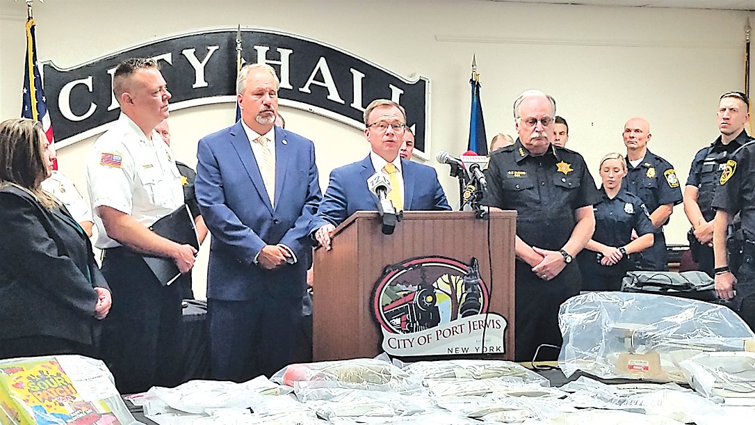 From left, Sullivan County District Attorney Meagan Galligan, Port Jervis Police Chief William Worden, Orange County District Attorney David Hoovler, Pike County District Ray Attorney Tonkin and Orange County Sheriff Carl DuBois discuss a major narcotics investigation on Wednesday.