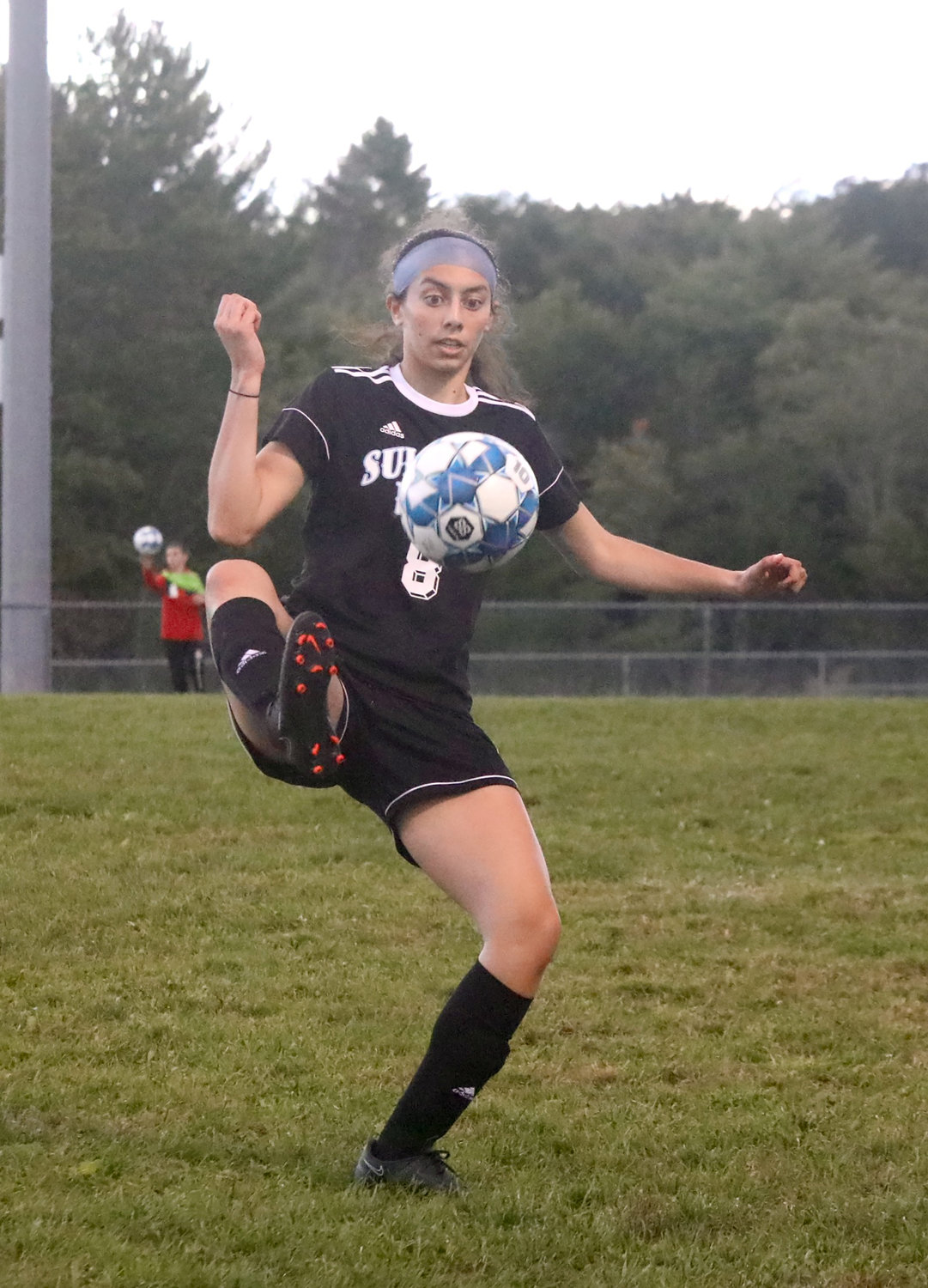 Sullivan West talented junior Viola Shami shows great footwork as she maneuvers the ball.