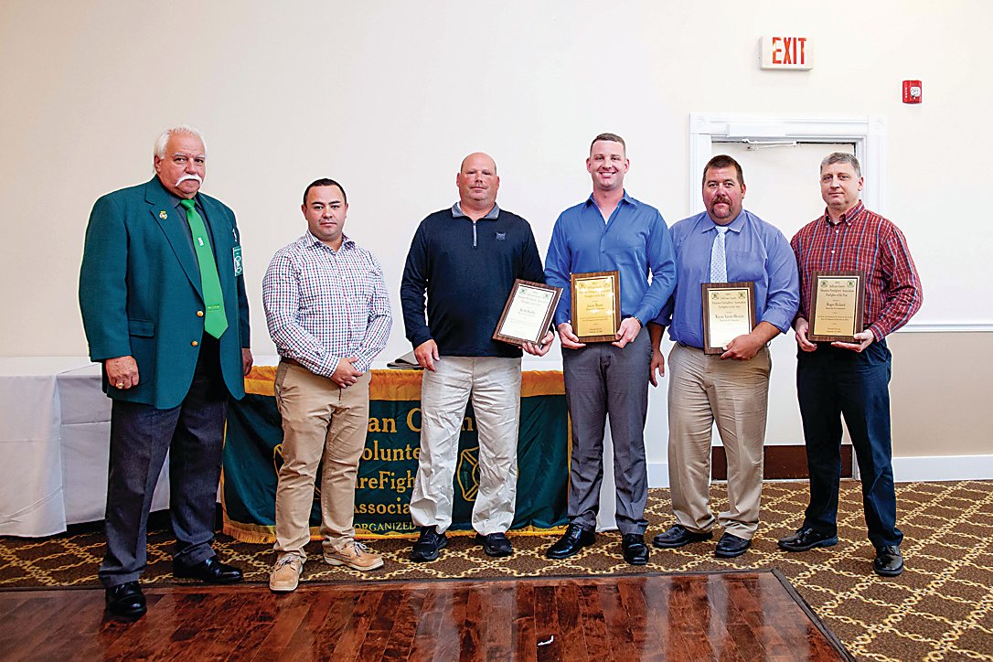Firefighters of the year, from the left SCVFA President Terrence Mullen, Monticello Fire Chief Jose Mora, Monticello Firefighters Keith Kurthy, Justin Mapes, Wayne Vandermeulen, and Roger Bisland.