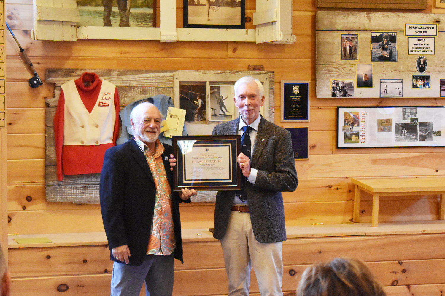 Charles Jardine (right) accepts his framed Hall of Fame induction award certificate from Ted Patlan, part of the Hall of Fame Committee Chair.