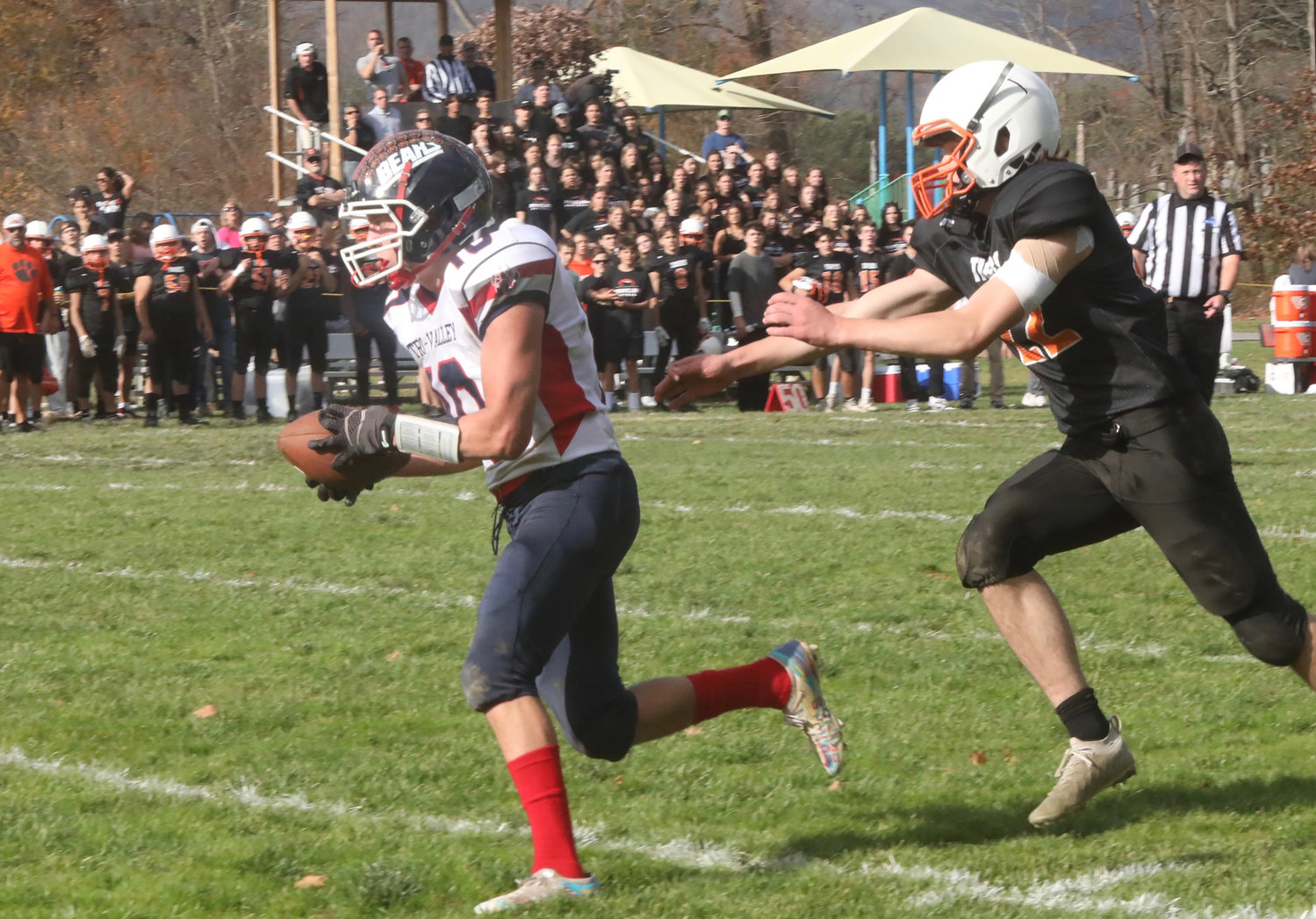 Zach Kitaychik outruns a Pawling defender for a 45-yard TD on a pass from Austin Hartman in the waning seconds of the first half to bring T-V within two points at 20-18.