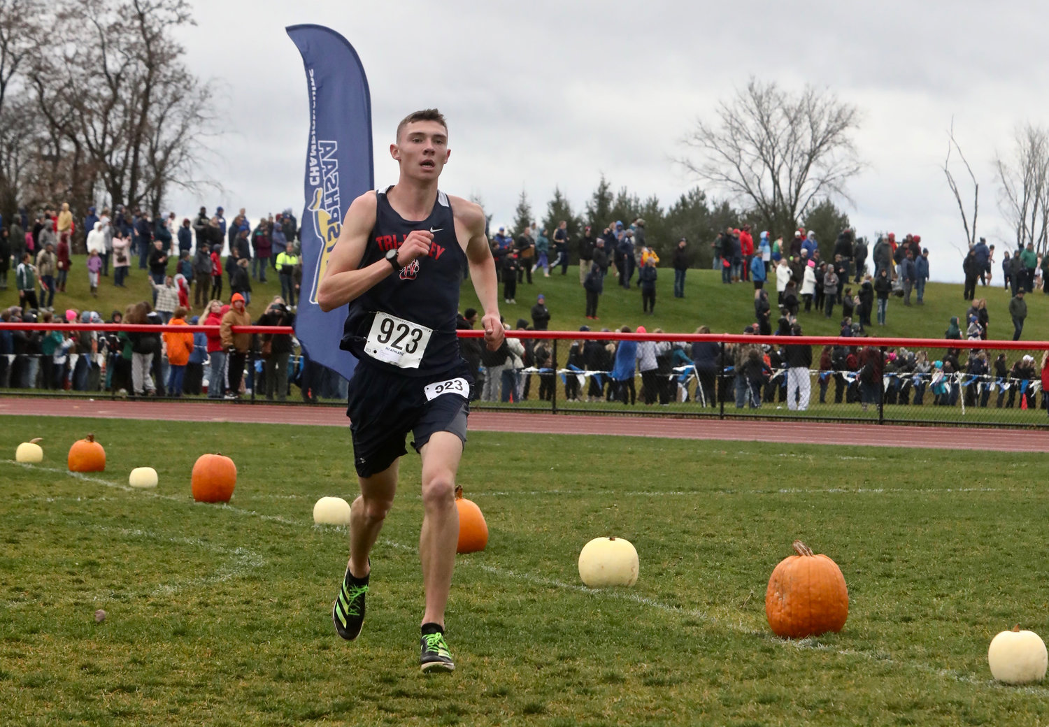 Tri-Valley senior Adam Furman approaches the finish line to become the 2022 NYSPHSAA Class D Cross-Country champion. His winning time was 16:21.20.