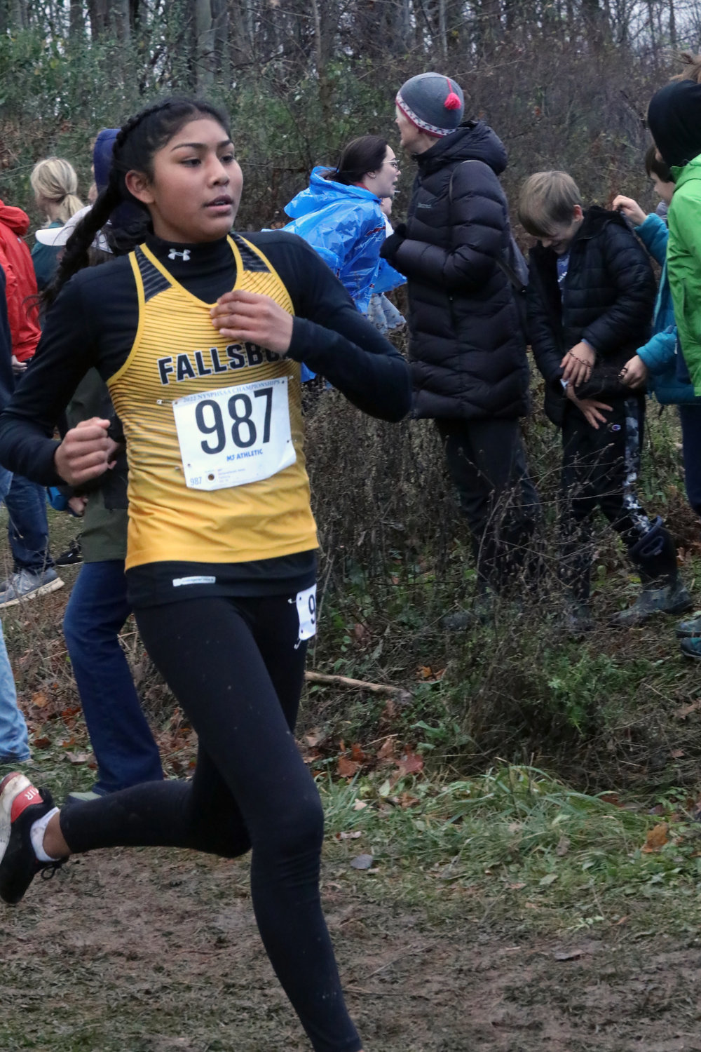 Fallsburg’s Nataly Zempoaltecatl races past the one-mile marker in the Class C race.