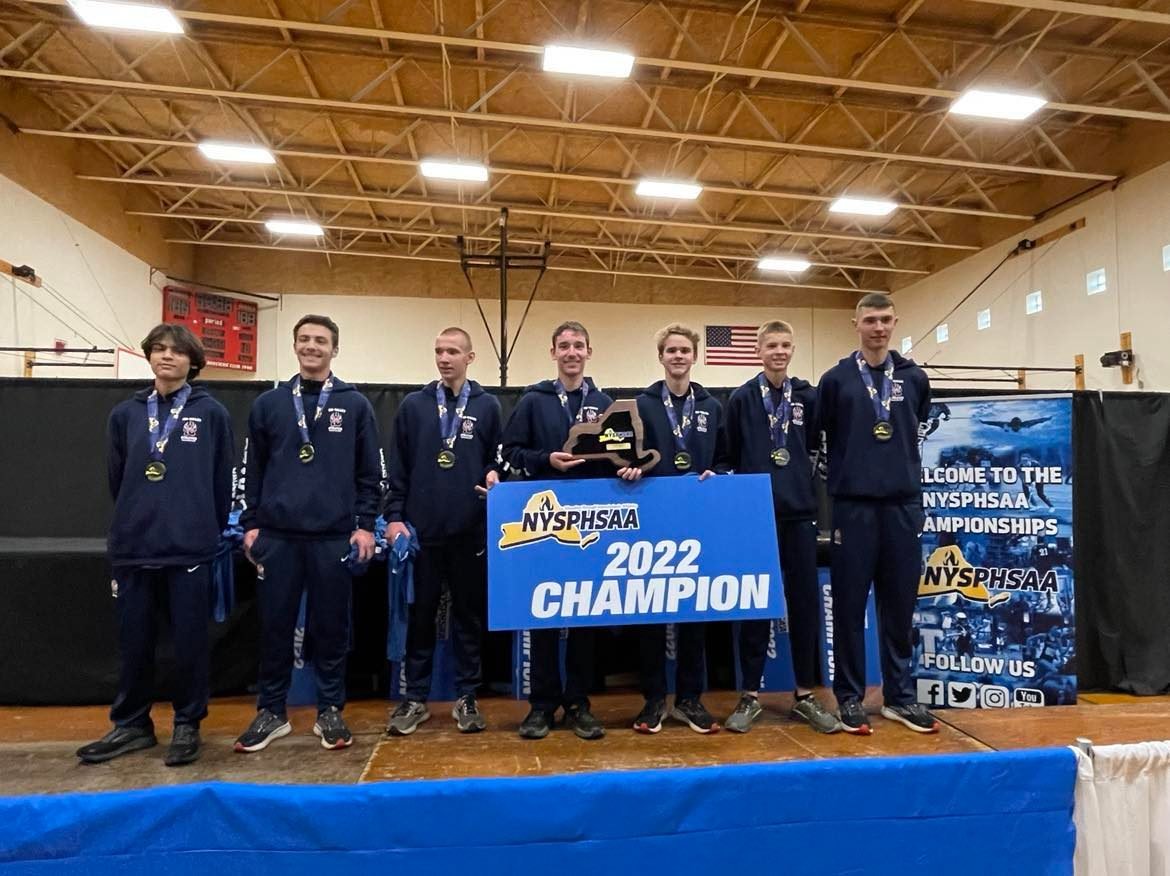 Tri-Valley repeats as NYSPHSAA Class D Cross-Country champions (left to right) Dayne Wall, Connor Weyant, Thomas Houghtaling, Vincent Mingo, Craig Costa, Van Furman and Adam Furman.