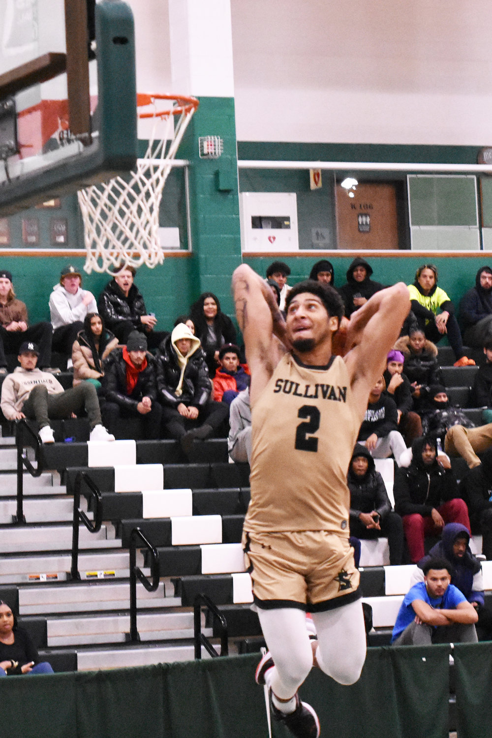 Sullivan’s Jay Alvarez (2) flies in for an uncontested dunk in the second half of a game against Ulster County.