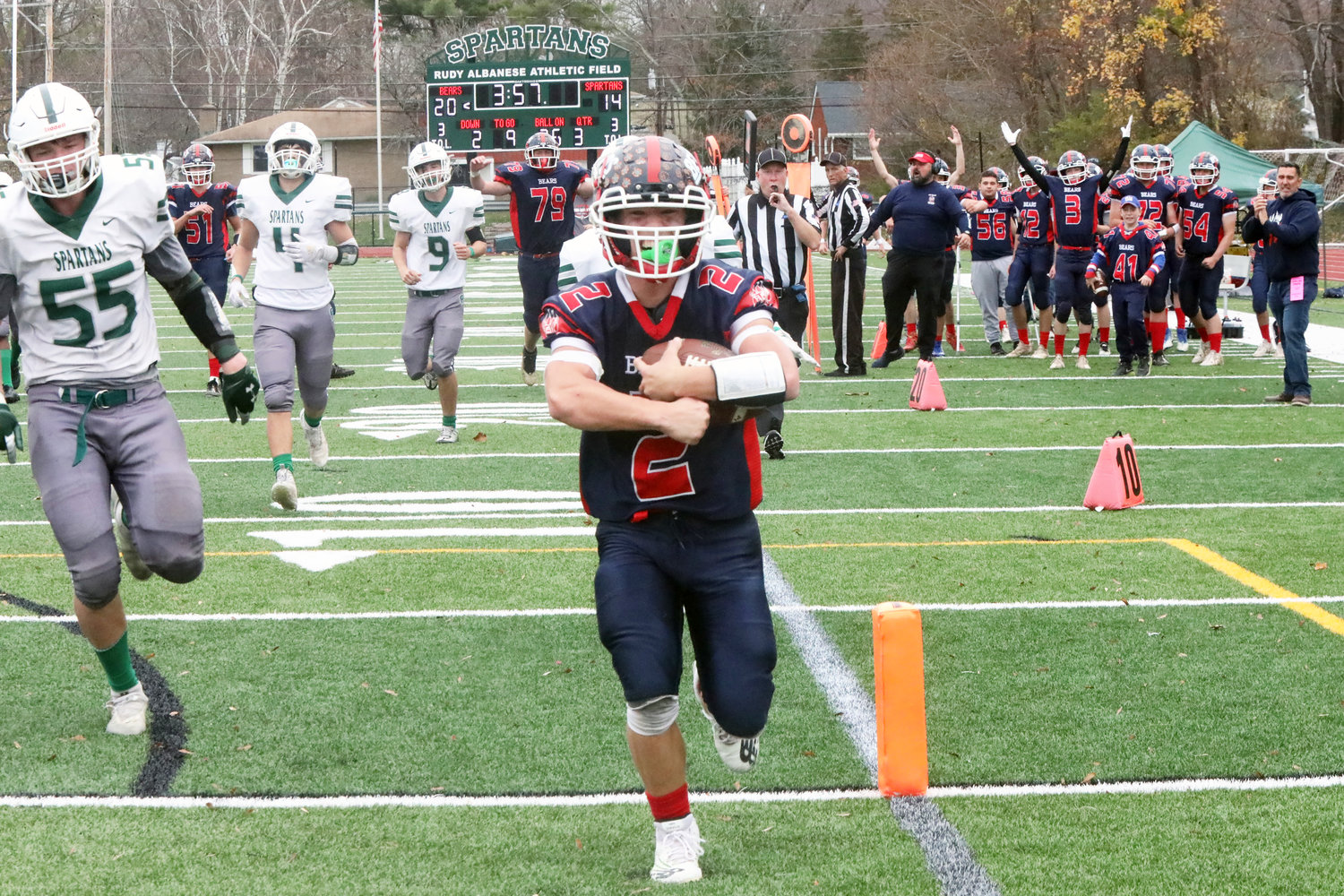 Austin Hartman outruns Spackenkill defenders to score of one his three rushing touchdowns in the championship game.