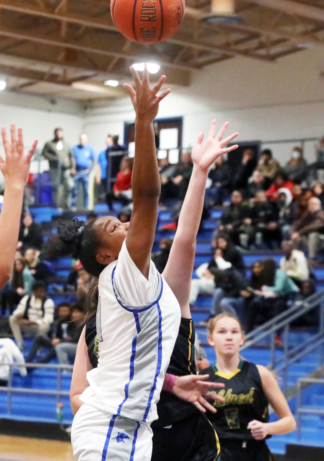 Monticello senior Aaliyah Mota scores two of her game-high 13 points.