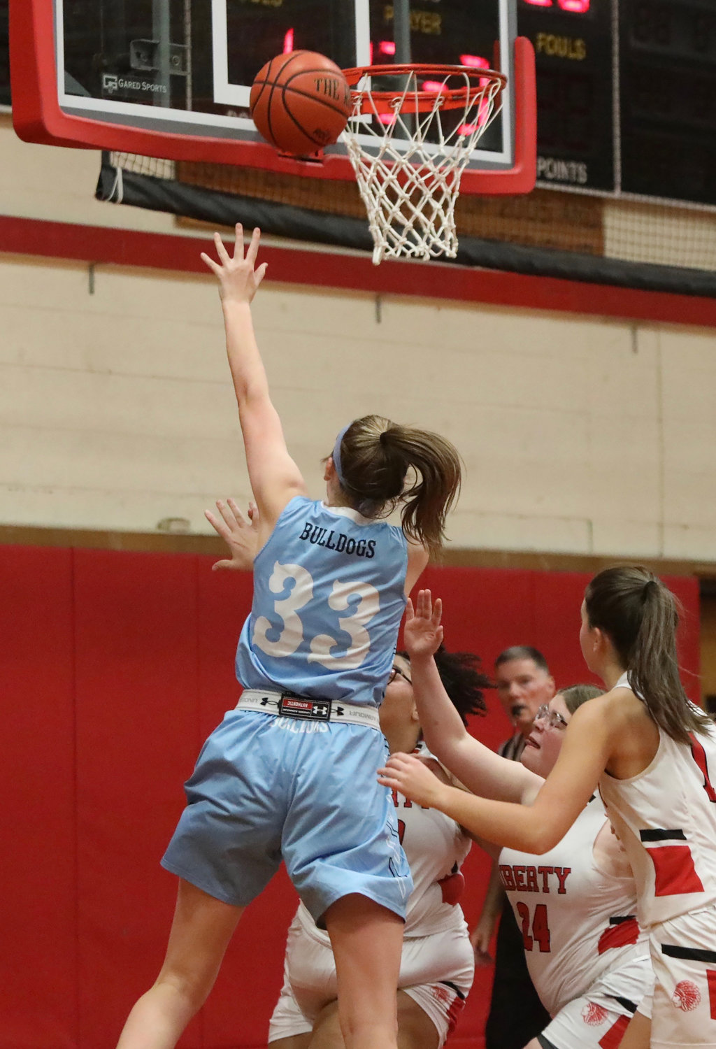Sullivan West senior Lanie Herbert rises up for two of her game-high 18 points.