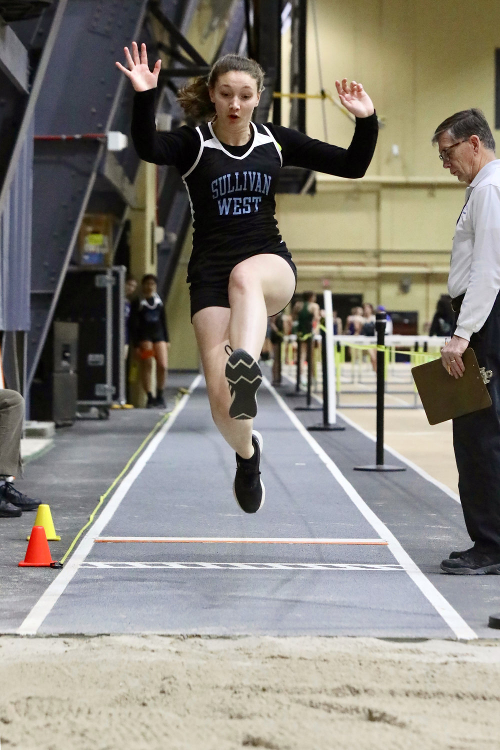 Sullivan West’s Kadence Everitt shows great form in the long jump. She captured fourth place in the Division VI event.