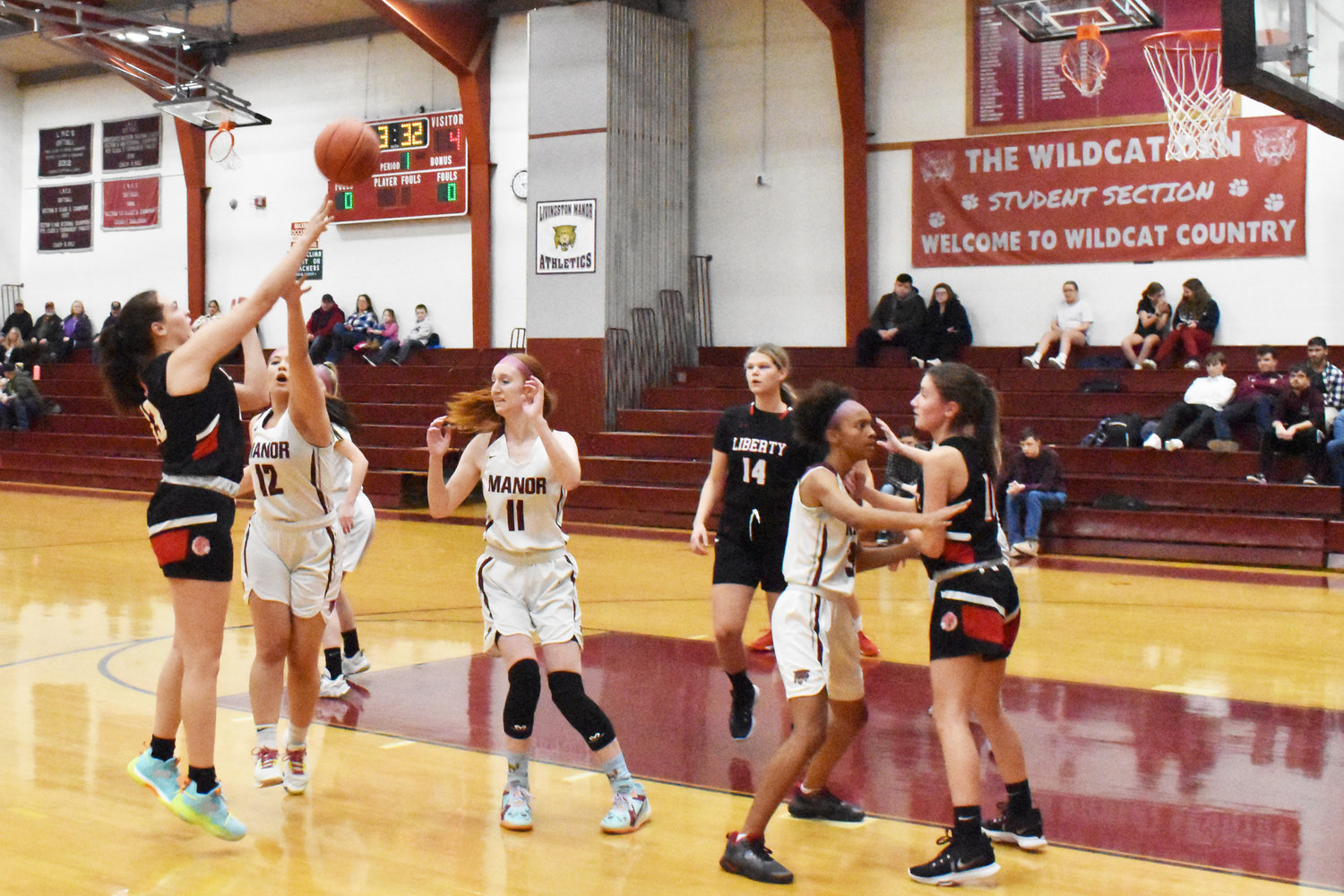 Emily Curry goes up for a shot while Nevaeha Jones closely guards Grace Wormuth. The deny ball defense is something that Livingston Manor deployed frequently during their Section IX Class D championship run last year.