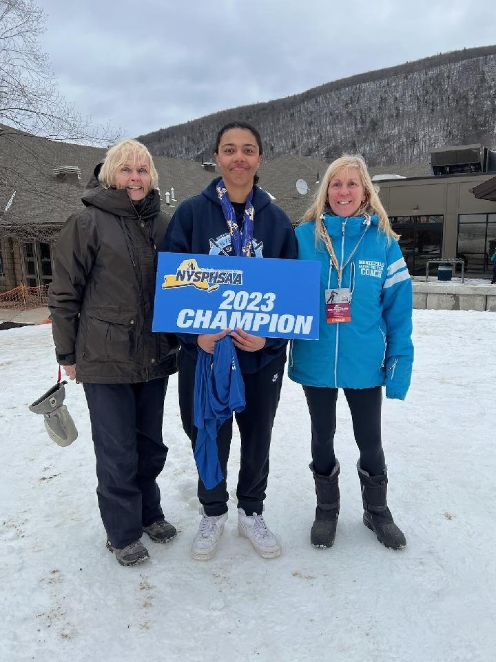 From left, Section 9 Chair Janet Carey, Slalom Champion Alexis Heins from Monticello, and Coach Lisa Bittinger.