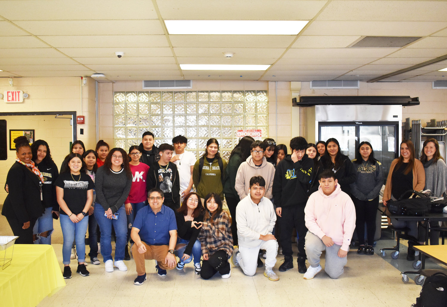 Group photo with English language learner students and teachers.