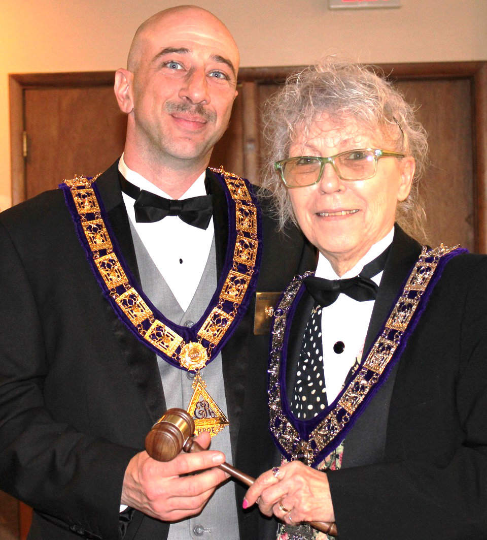 Past Exalted Ruler Ronni Yakin-Scannell presents the gavel of authority to new Exalted Ruler Brian Bock at a ceremony on April 1st. The Monticello Elks Lodge has 313 members.