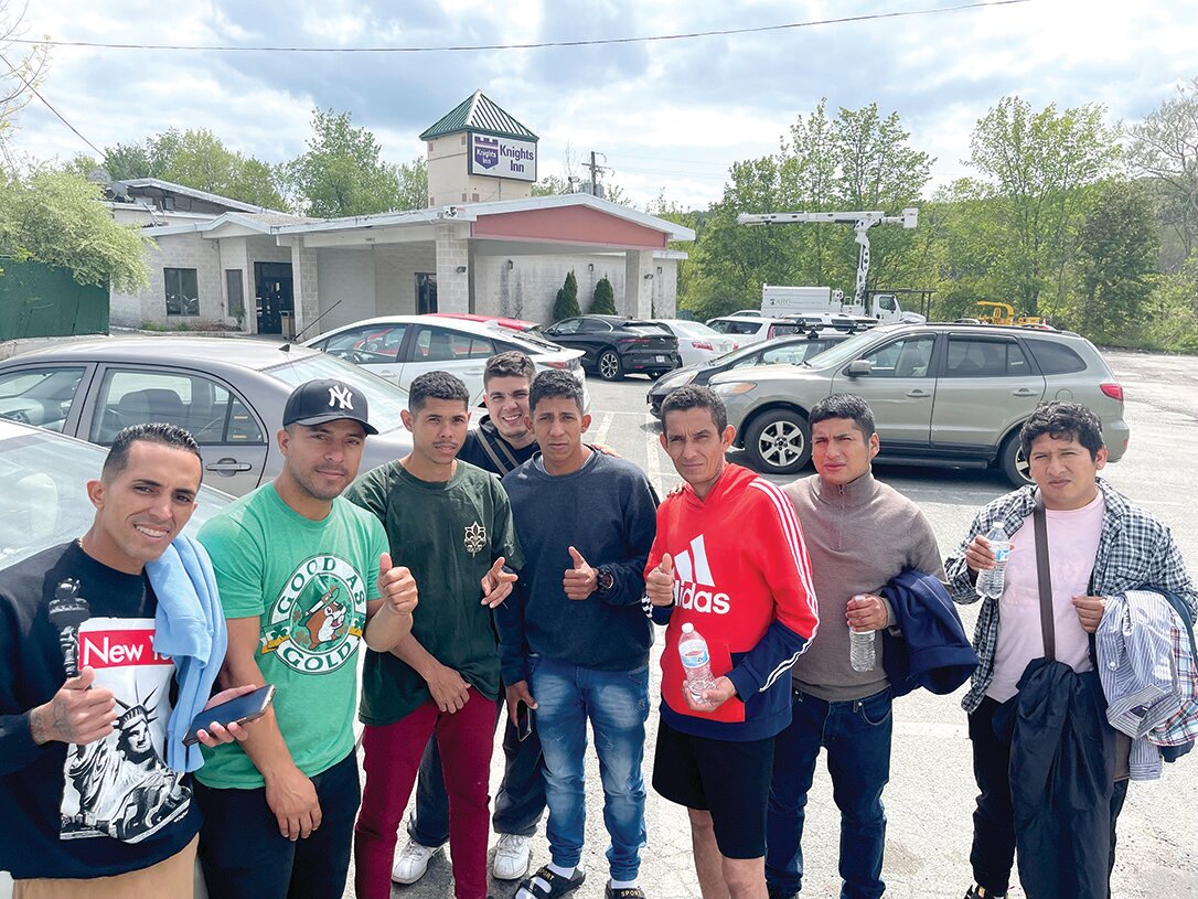 Eight men from Venezuela were out for a walk on Friday afternoon in front of the Knights Inn in Liberty, where they were staying.  The group of 40 people checked out 2:30 Sunday afternoon.