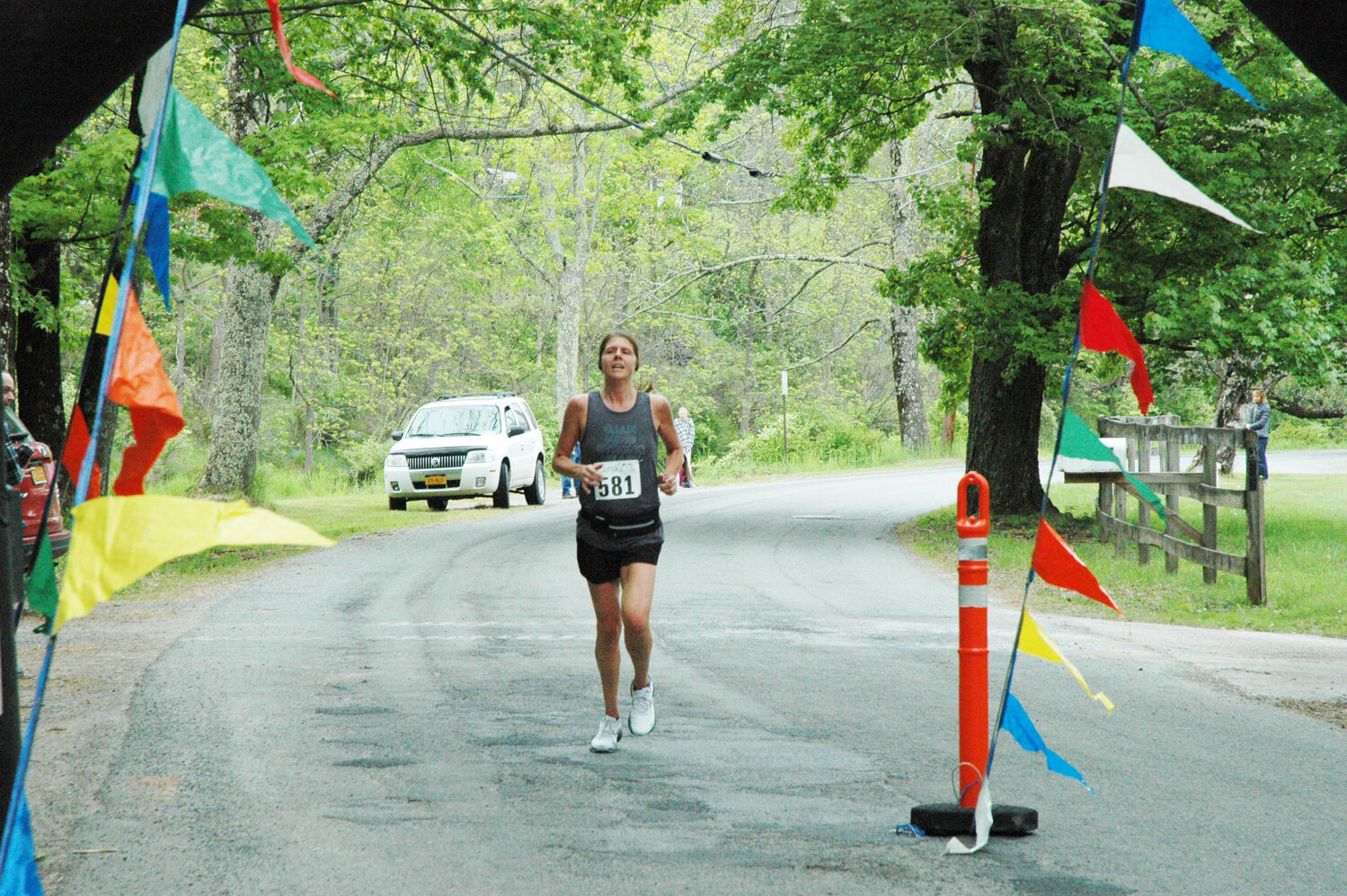 Kristy Sigelakis of Jeffersonville was the first female runner and fourth runner overall to cross the finish line in the 2023 5K Sap Run on Saturday, May 20. This year’s race was in honor of John McCormack, who was recently diagnosed with ALS.