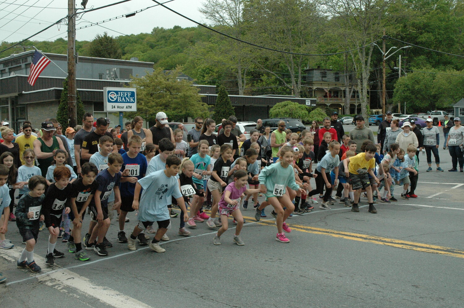 Led by Sullivan West students, runners of the 2023 5K Sap Run get off the start line on Main Street in Jeffersonville. This year’s race took place on Saturday, May 20 and was dedicated to John McCormack in his fight against ALS.