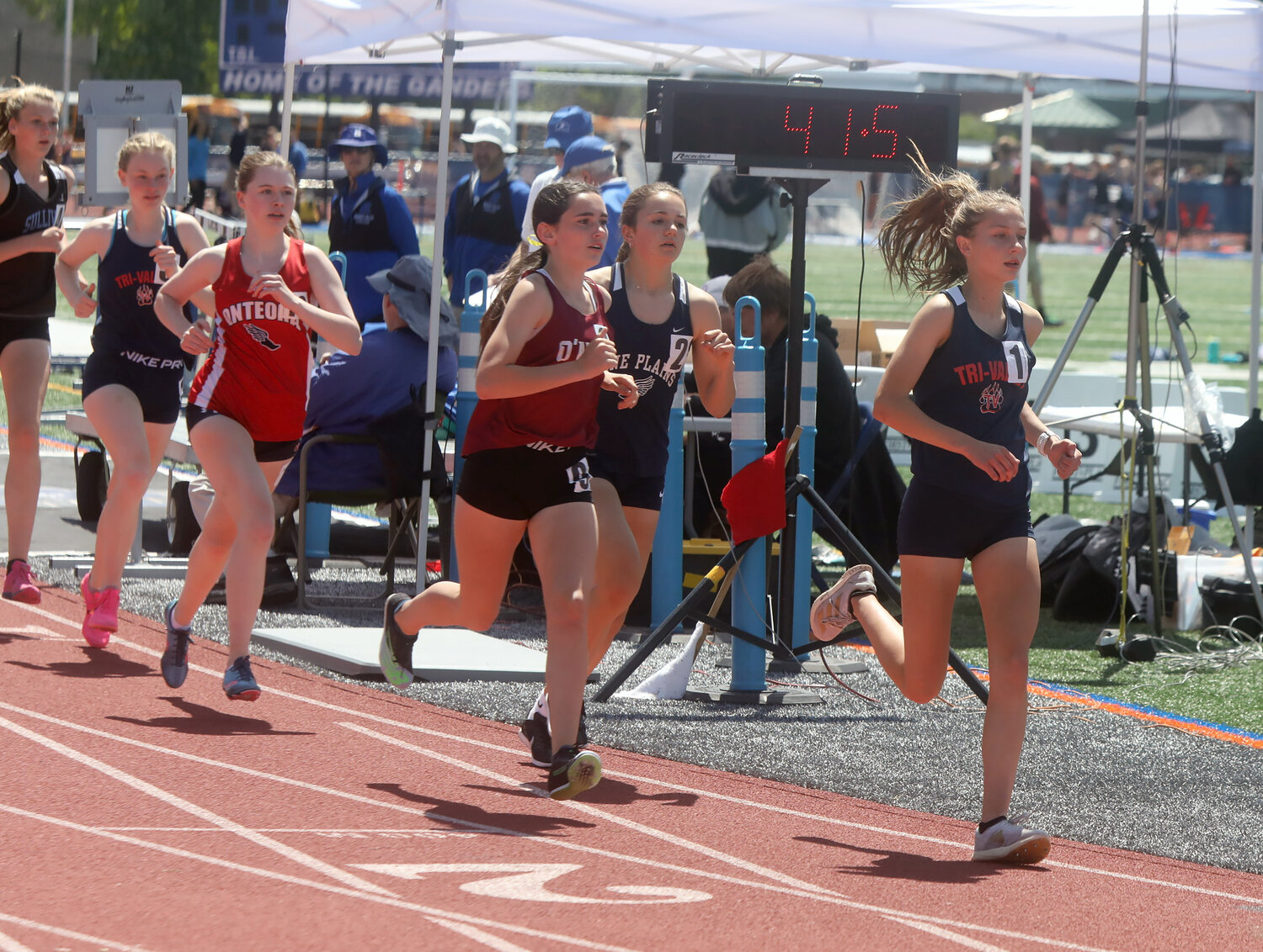 Tri-Valley eighth grader Anna Furman leads the pack on her way to winning the 3000. She also captured the 2000 steeplechase.