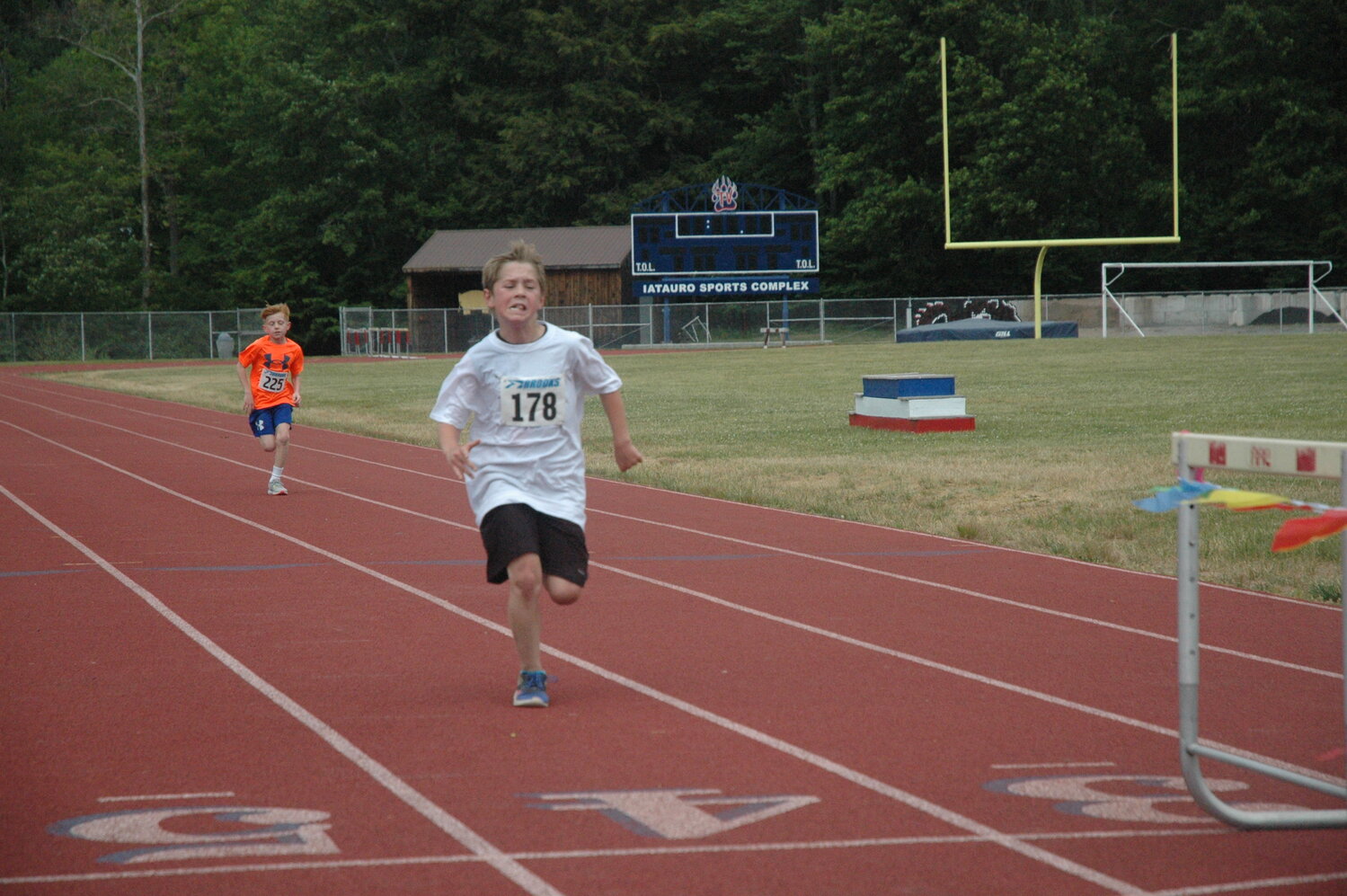 Chase Sheeley approaches the finish line with his friend, Bradley Kenney, right on his tail. The pair of future track stars duked it out for first place in the 1st Annual Veteran’s 5K at Tri-Valley Secondary School in Grahamsville.