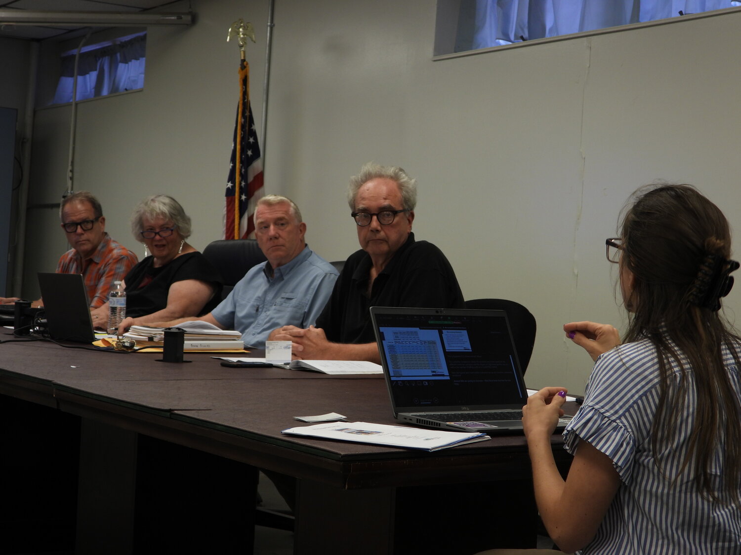 At right, RCAP Solutions Community Specialist Becky Sims breaks down the five options to choose from before the Tusten Town Board regarding possible changes to town water and sewer rates.