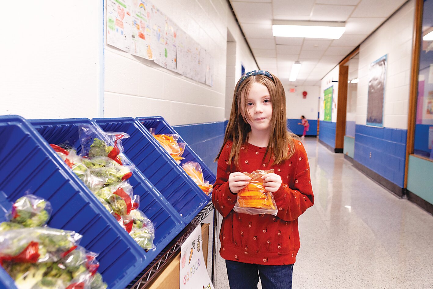 Thanks to a grant, the school now has healthy snack carts placed throughout the premises. Students can easily access nutritious options like carrot sticks and broccoli bags.