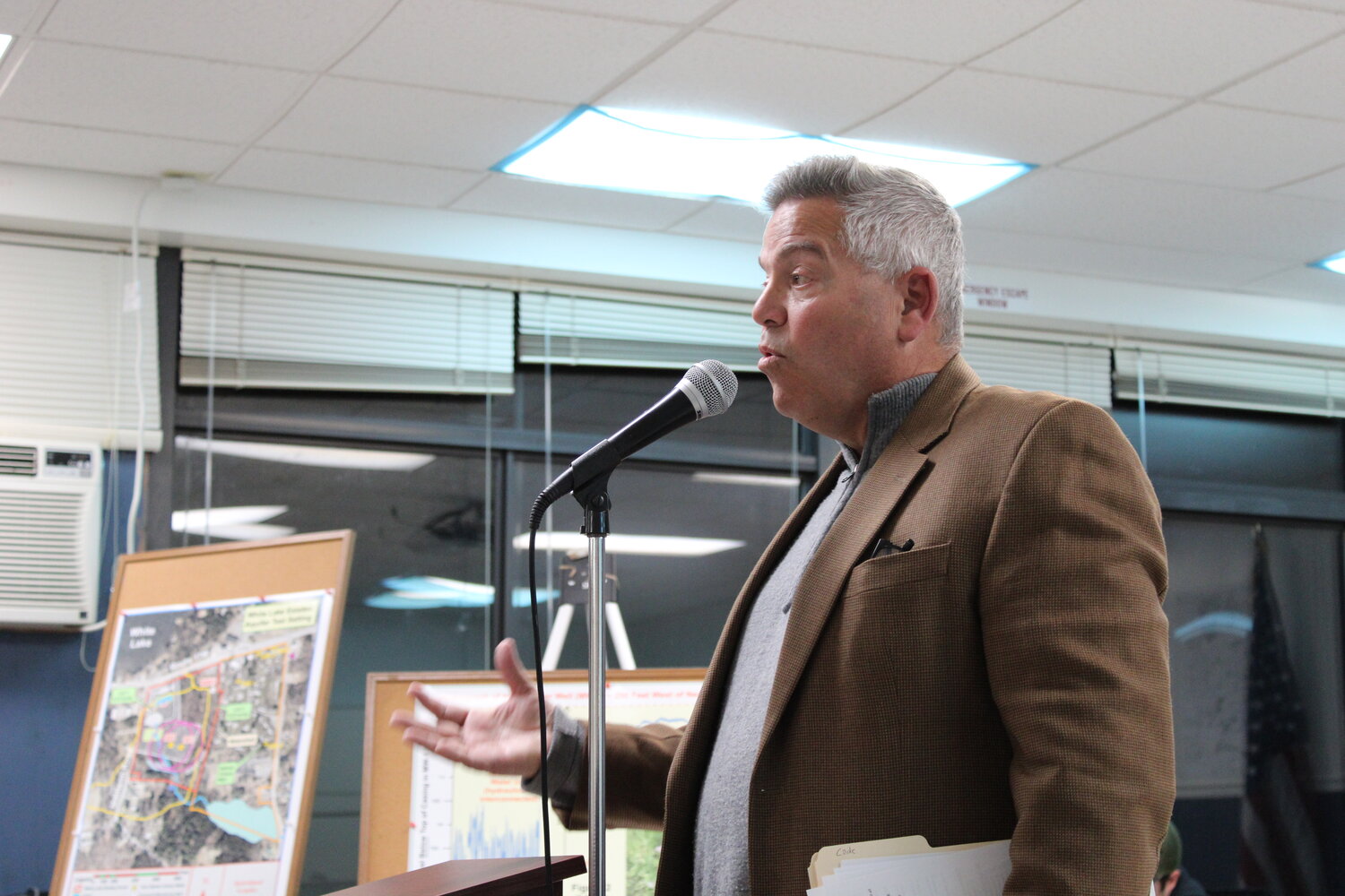 There was much information presented and debate had over the proposed White Lake Estates. At left, Bruce Johnson of Smallwood, voices concerns about the hotel project while attorney for the project, Jacob Billig, right, described the layout of the hotel property to the board and audience.