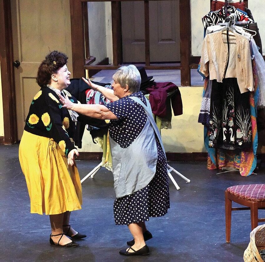 During a Liberty Center Association for the Arts dress rehearsal in February, actor Jessica Jones, as Rosalind Hay, left, greets Jan Bahner, as Ethel, for the production 