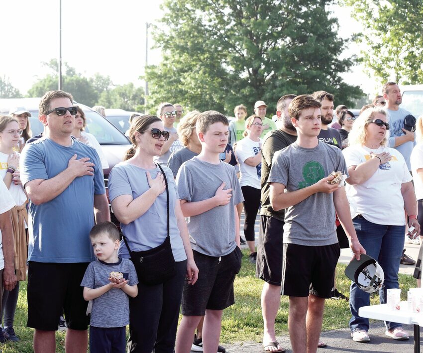 During the June 2023 United Way Day of Action, volunteers sing the national anthem before leaving to work on projects. This year, the United Way of Pettis County will host its Day of Action on June 22 at Katy Park.


File photo by Faith Bemiss-McKinney | Democrat