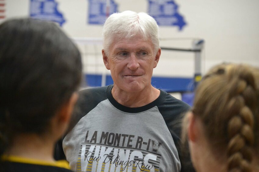 La Monte head volleyball coach Michael Finley listens to the team in a huddle. Finley, 64, died Tuesday, March 19.


Photo courtesy of Scott Floyd