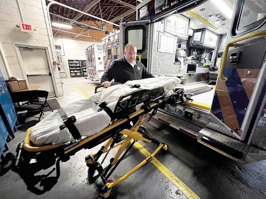 On Thursday, March 28, EMS Chief Roy Pennington shows how the bed in the new Pettis County Ambulance District Truck No. 8 is a power load bed, helping prevent back injuries for paramedics and EMTs. The new 2022 Ford E450 Super Duty was delivered to PCAD Headquarters on March 9.


Photo by Faith Bemiss-McKinney | Democrat