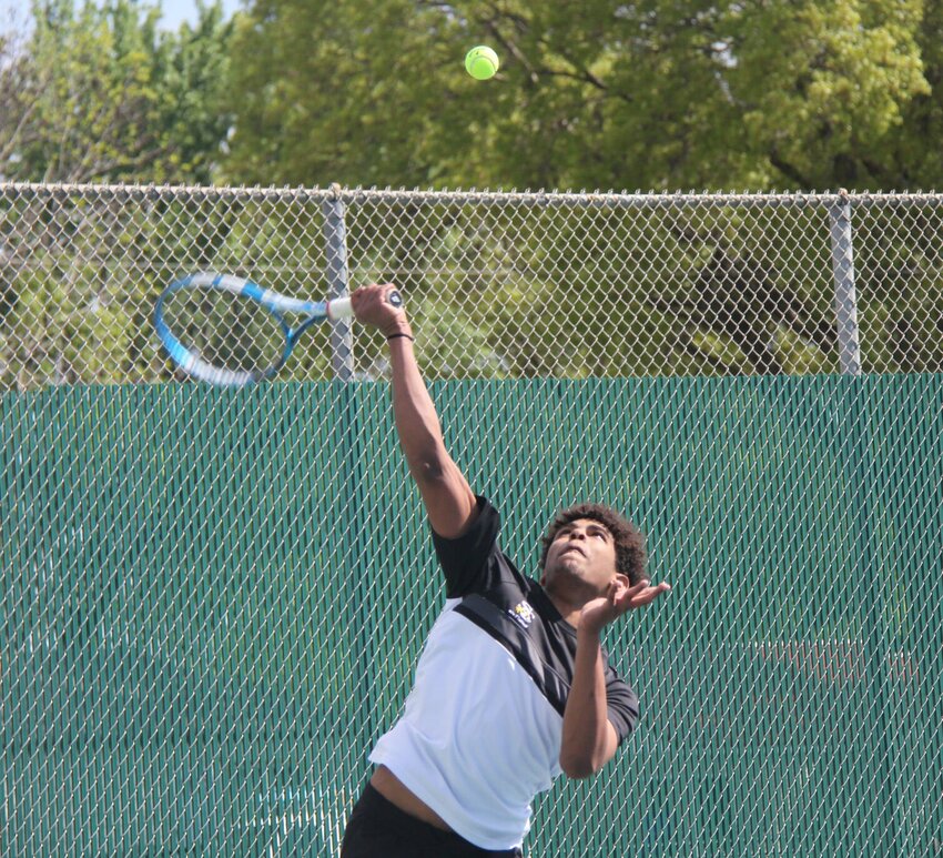 Senior Devin Myers serves the ball during a doubles match at the Smith-Cotton Invitational Tennis Tournament Friday. Myers and his partner, senior Jordan Baldwin, placed fourth in their doubles bracket.


Photo by Jack Denebeim | Democrat