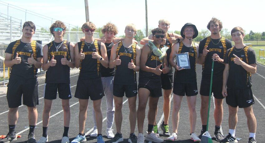 The Smithton boys track and field team celebrates placing first at the Kaysinger Conference Track and Field Meet Wednesday in Smithton. The team put up 181 points to claim the title.


Photo by Jack Denebeim | Democrat