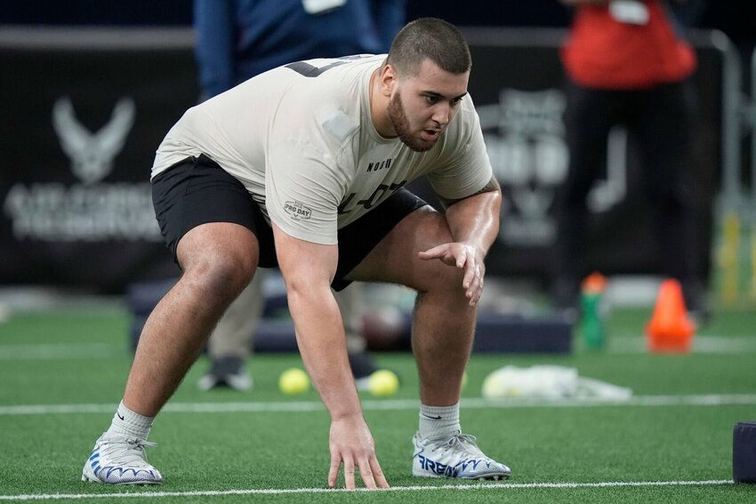 Kansas offensive lineman Dominick Puni lines up for a drill during Big 12 NCAA college NFL football pro day Saturday, March 30, 2024, in Frisco, Texas.


Photo by LM Otero | AP Photo
