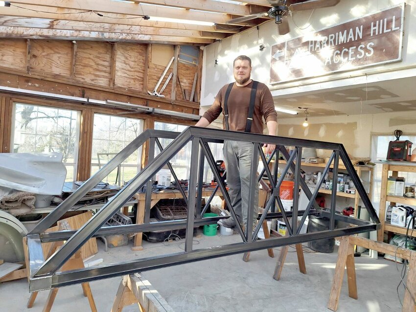 Blackwater carpenter Luke Cornine stands on the 19th-century replica of the Pratt Truss Bridge he is working on. During Blackwater's May Fest, the completed bridge will be unveiled at 2 p.m. Saturday, May 11.


Photo courtesy of the Blackwater Preservation Society