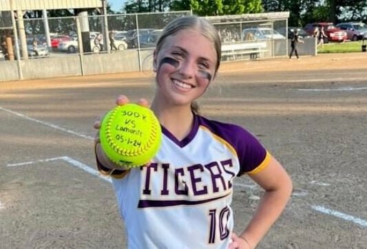 Green Ridge junior Mikensey DeVorss celebrates her 300th career strikeout with her milestone ball after the team’s 17-5 win over La Monte on Wednesday, May 1. DeVorss pitched four innings and struck out eight against the Vikings.


Photo courtesy of Kaylee Schmidli