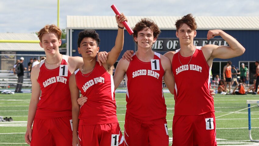 The Sacred Heart boys 4x800m relay team, from left to right, Logan Howell, Yovanny Cardenas, Jackson Manning and Max Van Leer celebrate winning a district title at the Class 1 District 7 meet in Holden Saturday, May 4. The team placed first with a time of 8:56.63.


Photo courtesy of Carrie Smith