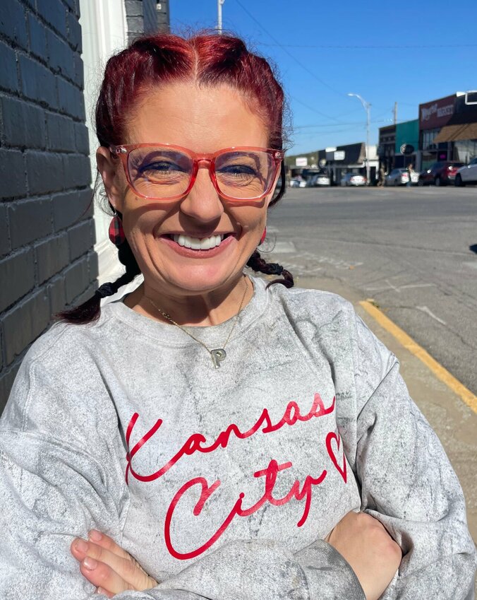 Lacy Parks of Knob Noster can't stop smiling since her new dental work was completed Monday, Oct. 14. Parks lost teeth in an abusive relationship four years ago but was helped through the Give Back a Smile program.


Photo by Chris Howell | Democrat