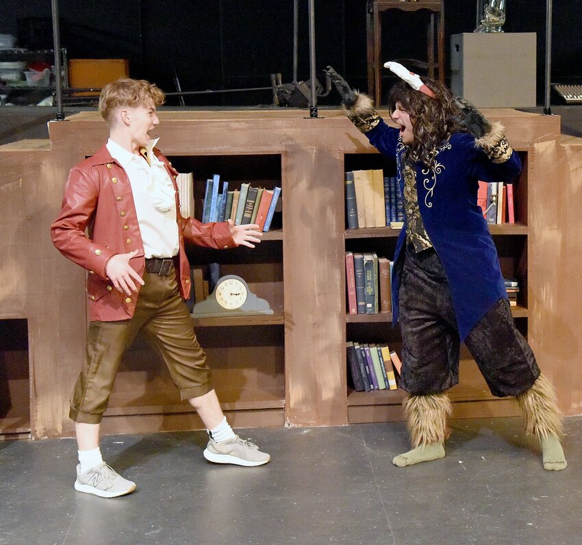 On Wednesday, March 19, Sacred Heart School students Logan Howell, left, as Gaston, and Anthony Sierra, as the Beast, perform a scene during a dress rehearsal for the upcoming musical "Beauty and the Beast Jr." The musical will be presented at the Hayden Liberty Center on March 28 and 29.


Photo by Faith Bemiss-McKinney | Democrat